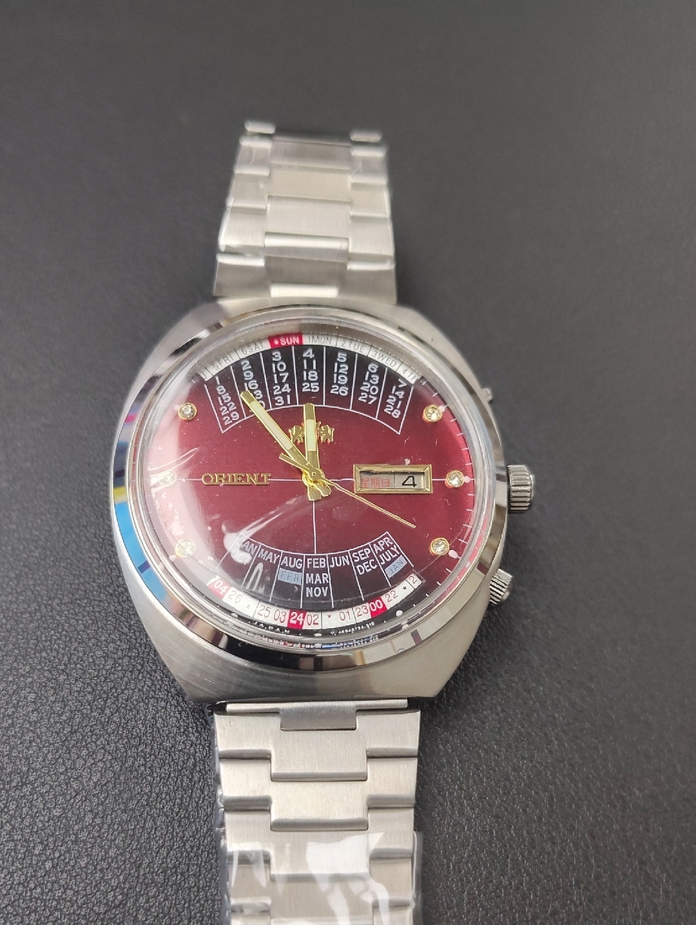 Orient Red Dial Stainless Steel Calendar Watch